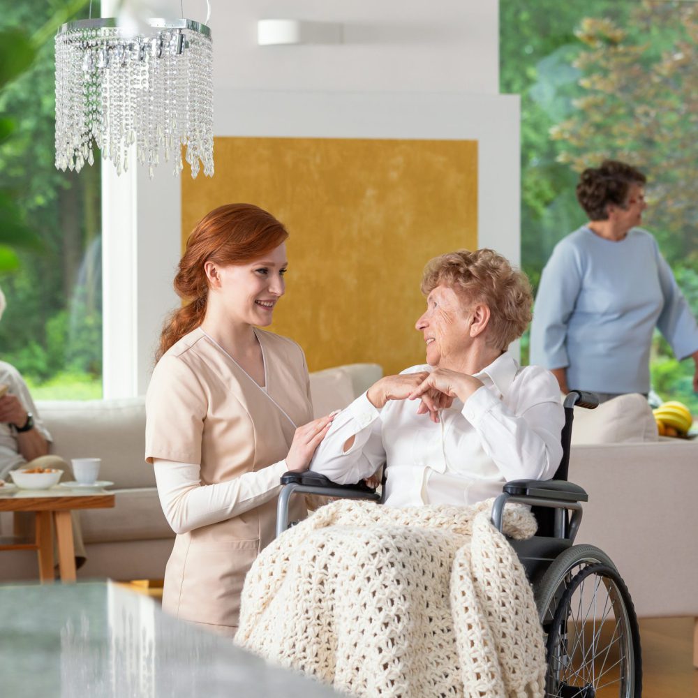 seniors-in-a-luxury-living-room-of-a-private-retir-2021-08-26-15-45-39-utc